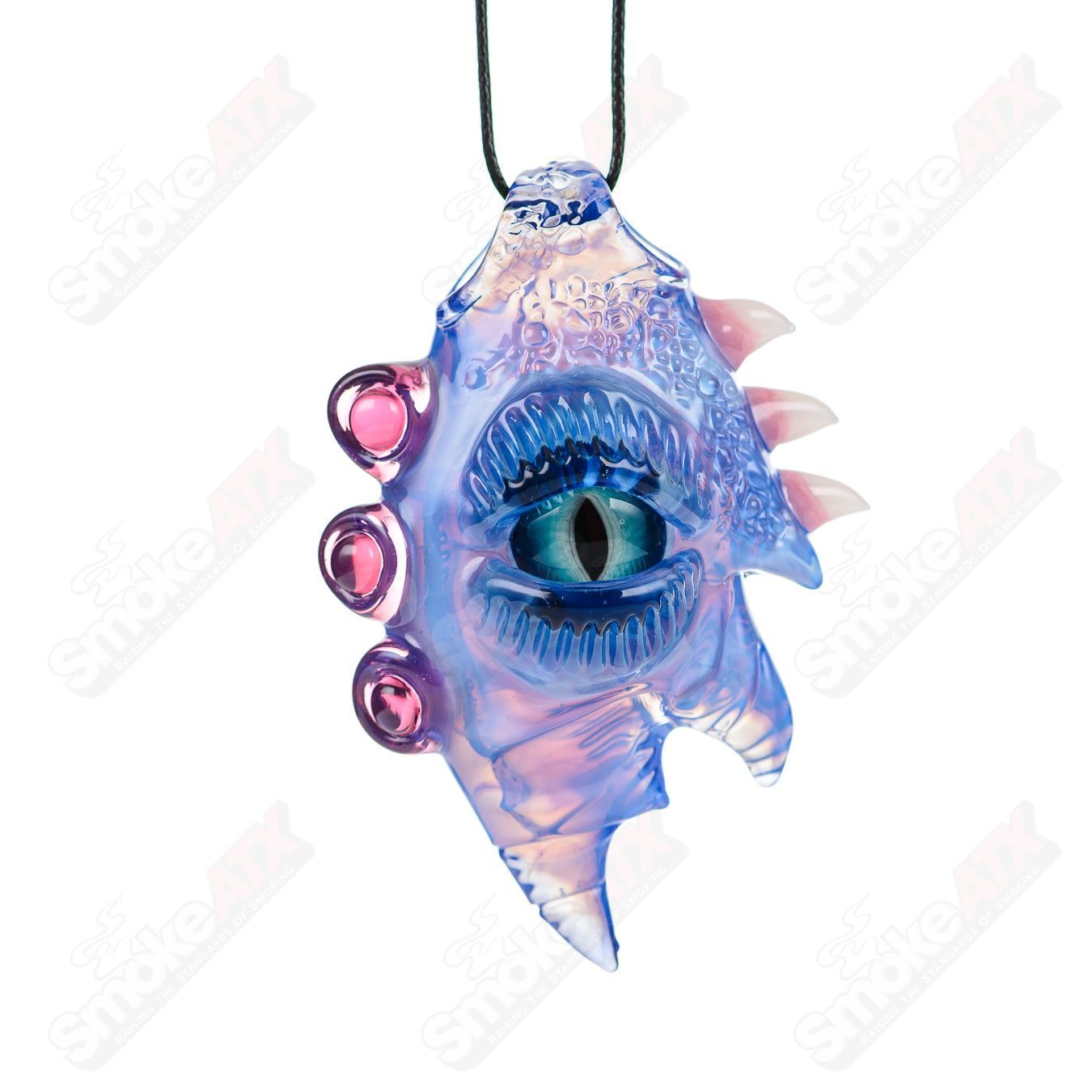 Salt Glass Skyline/Stargazer pendant featuring a colorful glass design with intricate patterns and a sleek, modern shape.