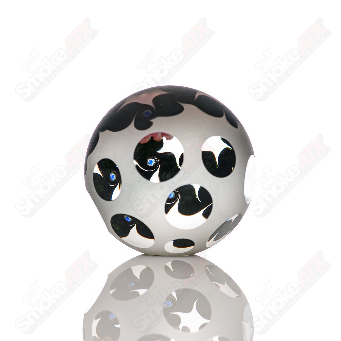 Pink faceted marble Raj K glass from Raj Kommineni Glass, featuring intricate glass marbles on a clear heady glass pipe.