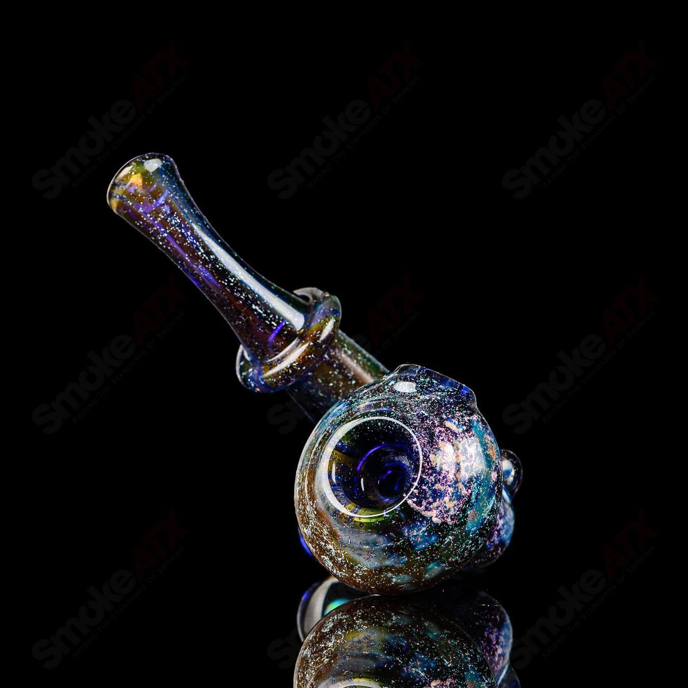 JMass Quasar Tech Sherlock glass pipe by Melodium, clear heady glass with intricate design and a classic Sherlock shape.