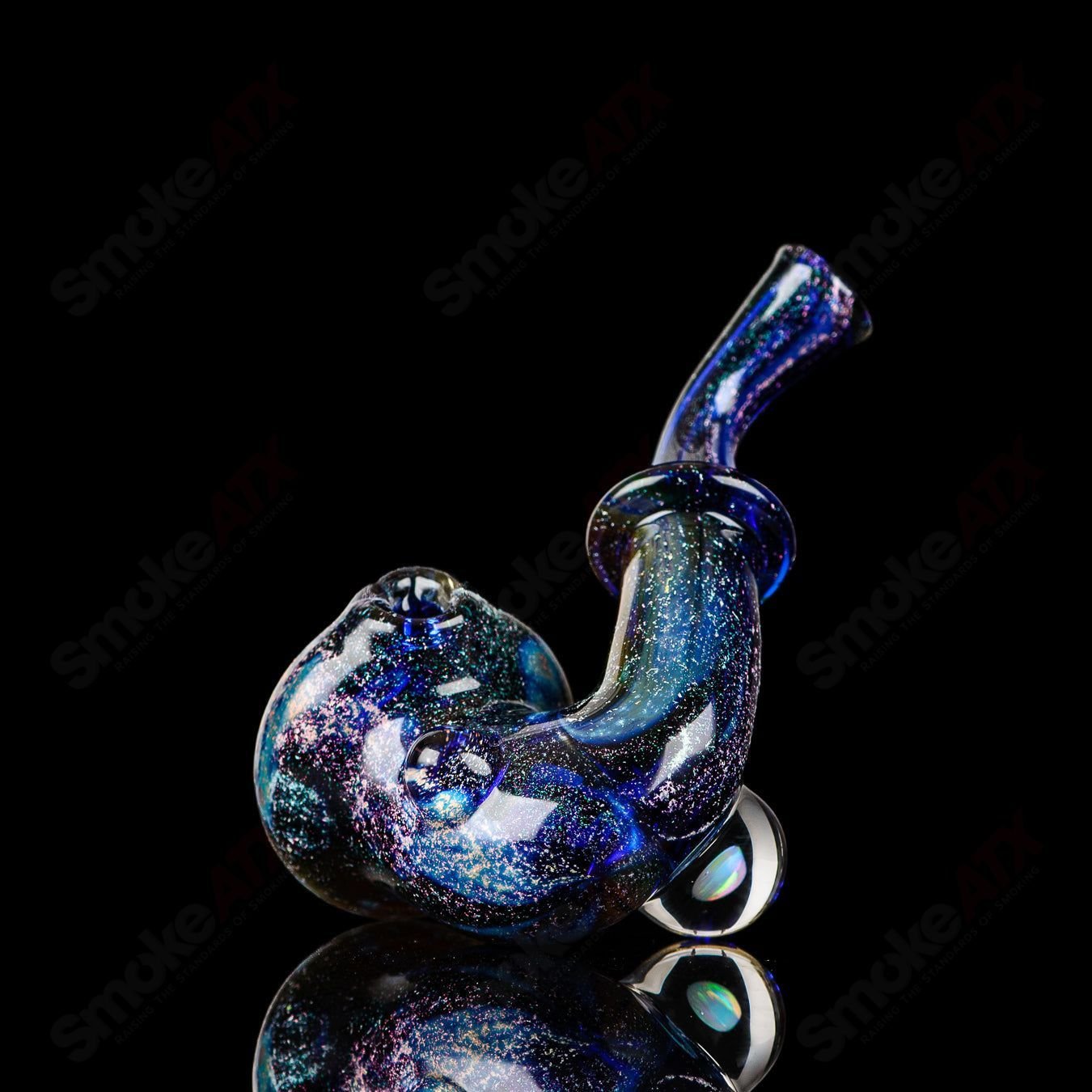 JMass Quasar Tech Sherlock heady glass pipe with intricate glasswork and clear design, crafted by Melodium and JMass.