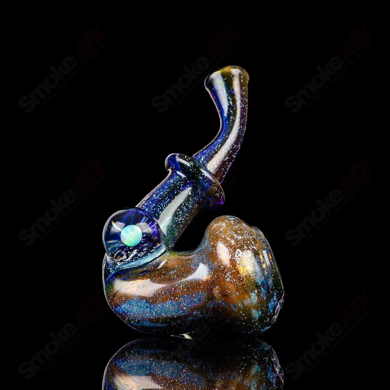 JMass Quasar Tech Sherlock heady glass pipe with intricate glass design and clear mouthpiece, crafted by Melodium and JMass.