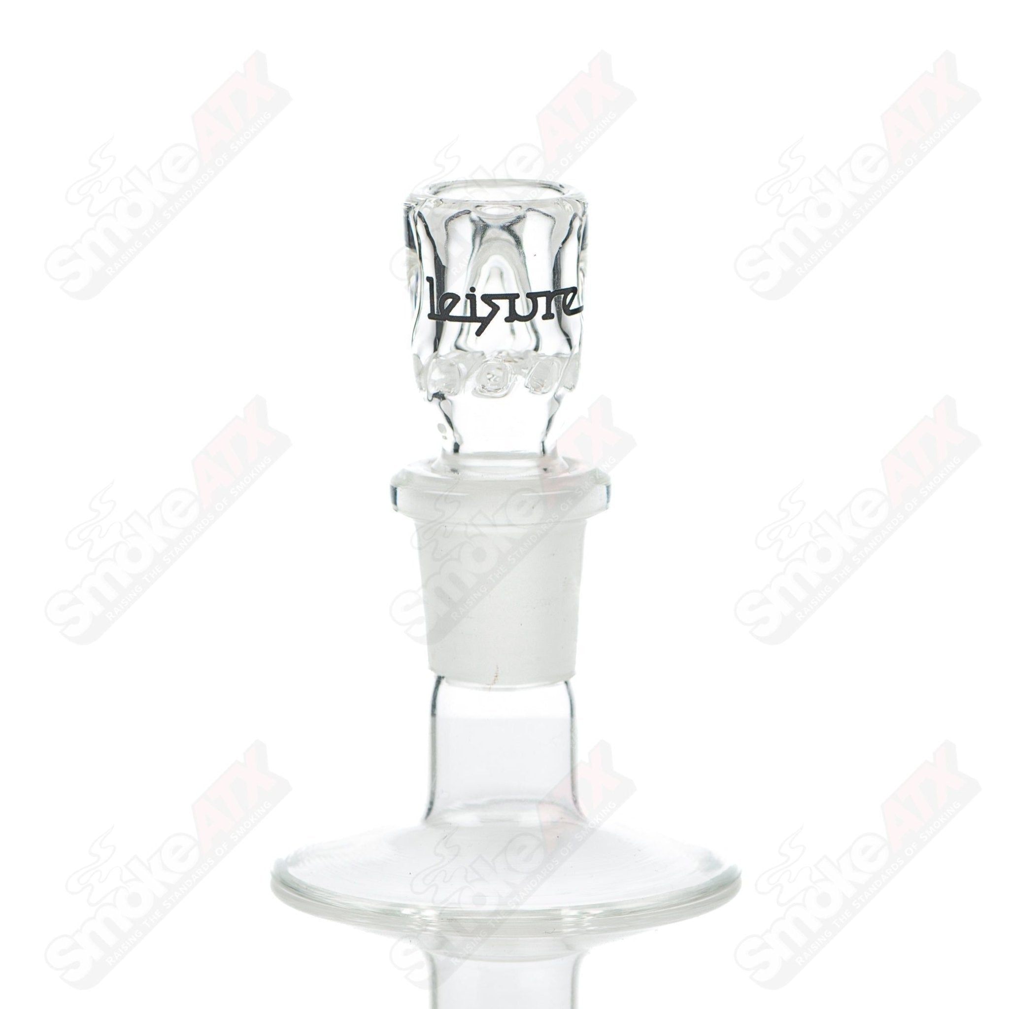 Leisure Glass Rasta 44 Mag Leisure concentrate rig with colorful Rasta design and clear glass body for dabbing concentrates.