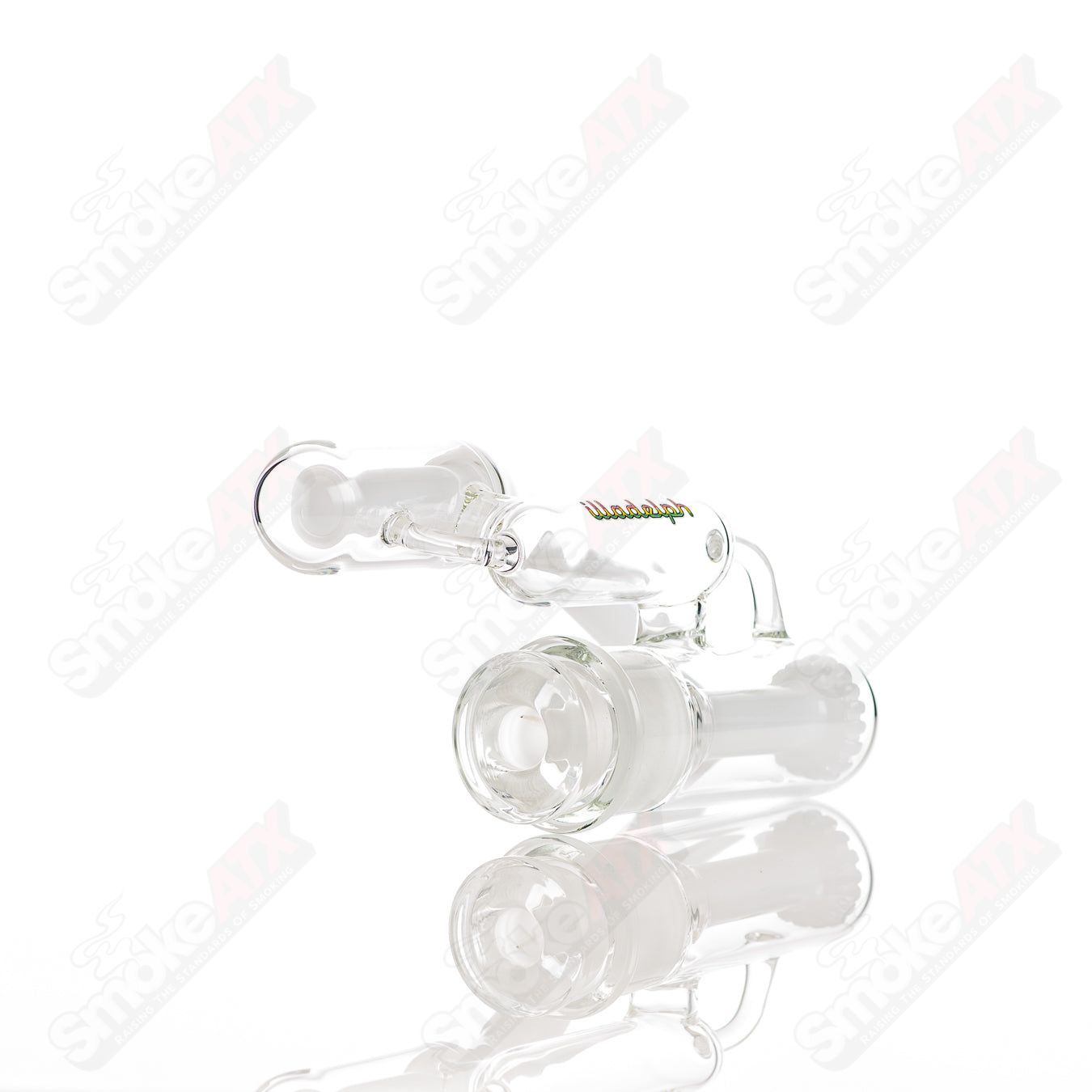 Illadelph Rasta Disc Ash Catcher made of glass, featuring colorful Rasta design and intricate glasswork for smoking accessories.