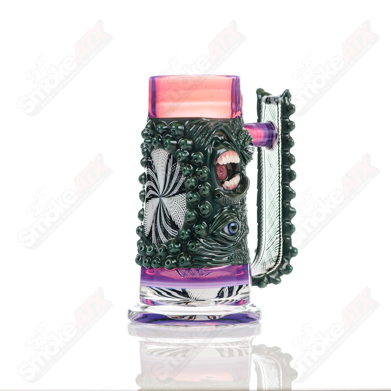 Reticello Many Face Drinking Mug by Salt Glass, handcrafted heady glass cup with intricate reticello design and multiple face patterns.