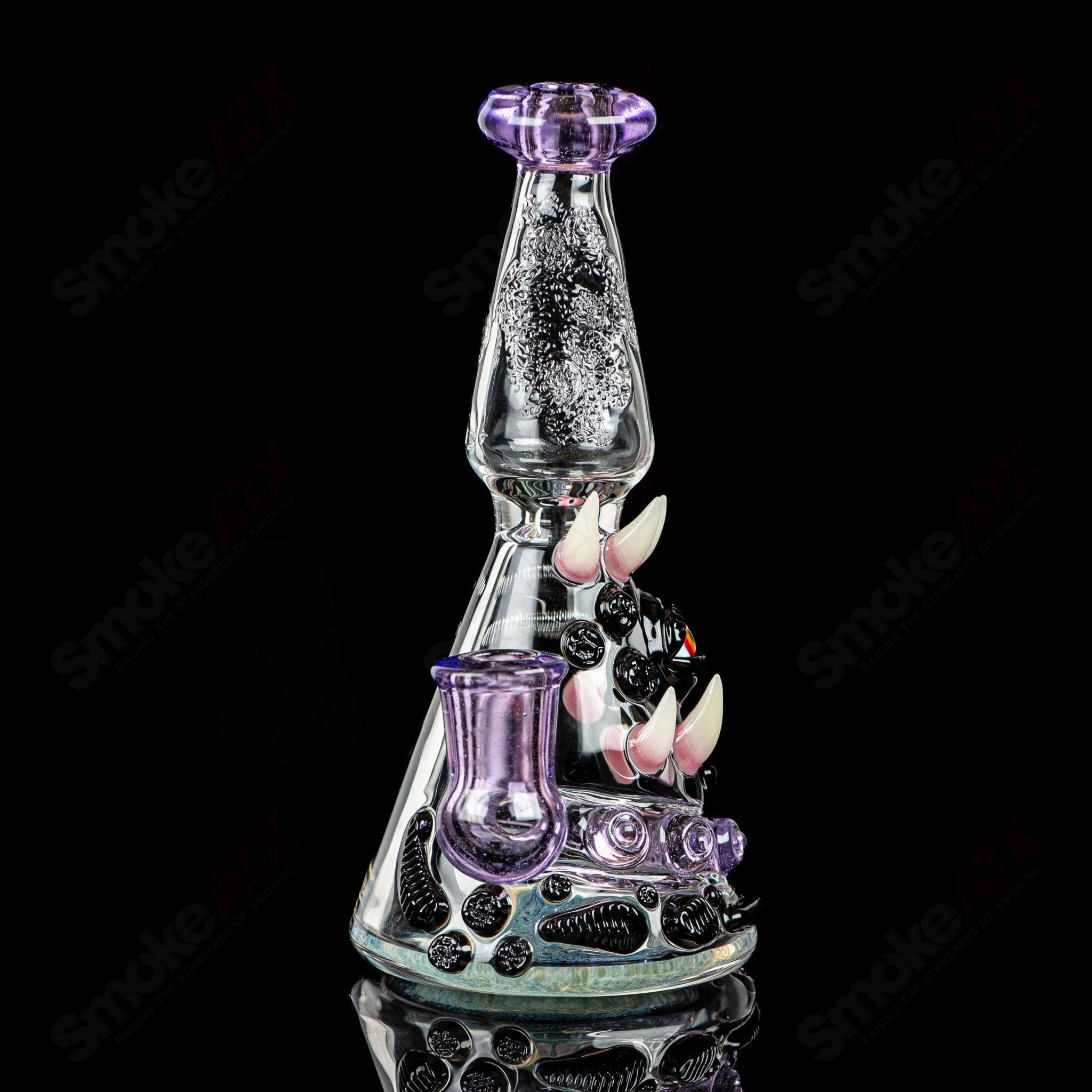RipCurl by Helix & Salt Glass Heady Concentrate Rig with intricate glass art and colorful design for dabbing and concentrates.