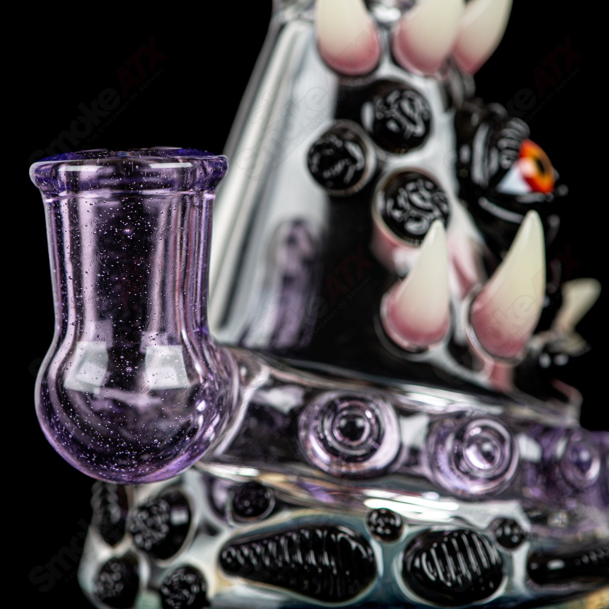 RipCurl by Helix and Salt Glass heady concentrate rig with intricate glasswork and vibrant colors, designed for concentrate use.
