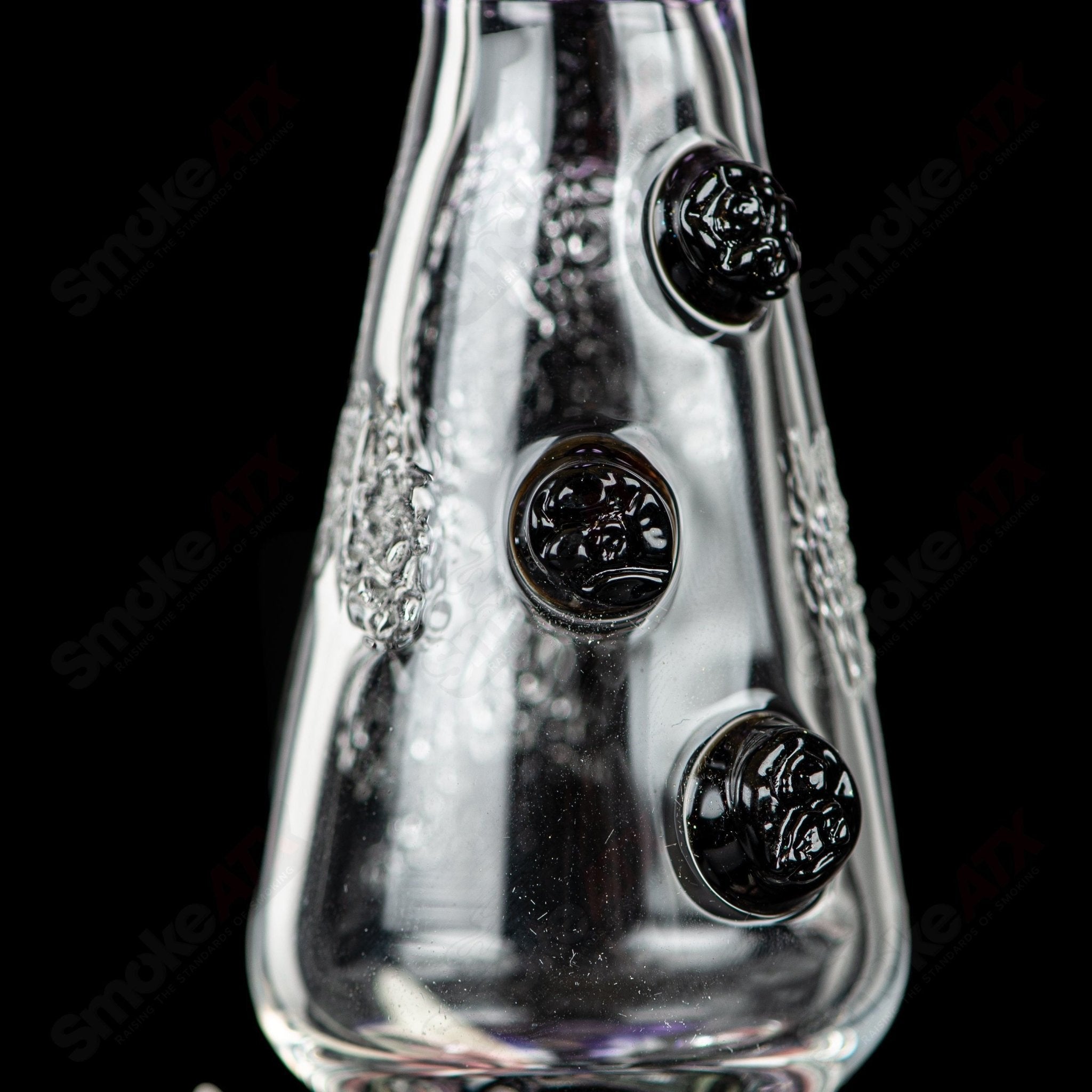 RipCurl by Helix & Salt Glass heady concentrate rig with intricate glasswork and vibrant colors, designed for enhanced dabbing experience.