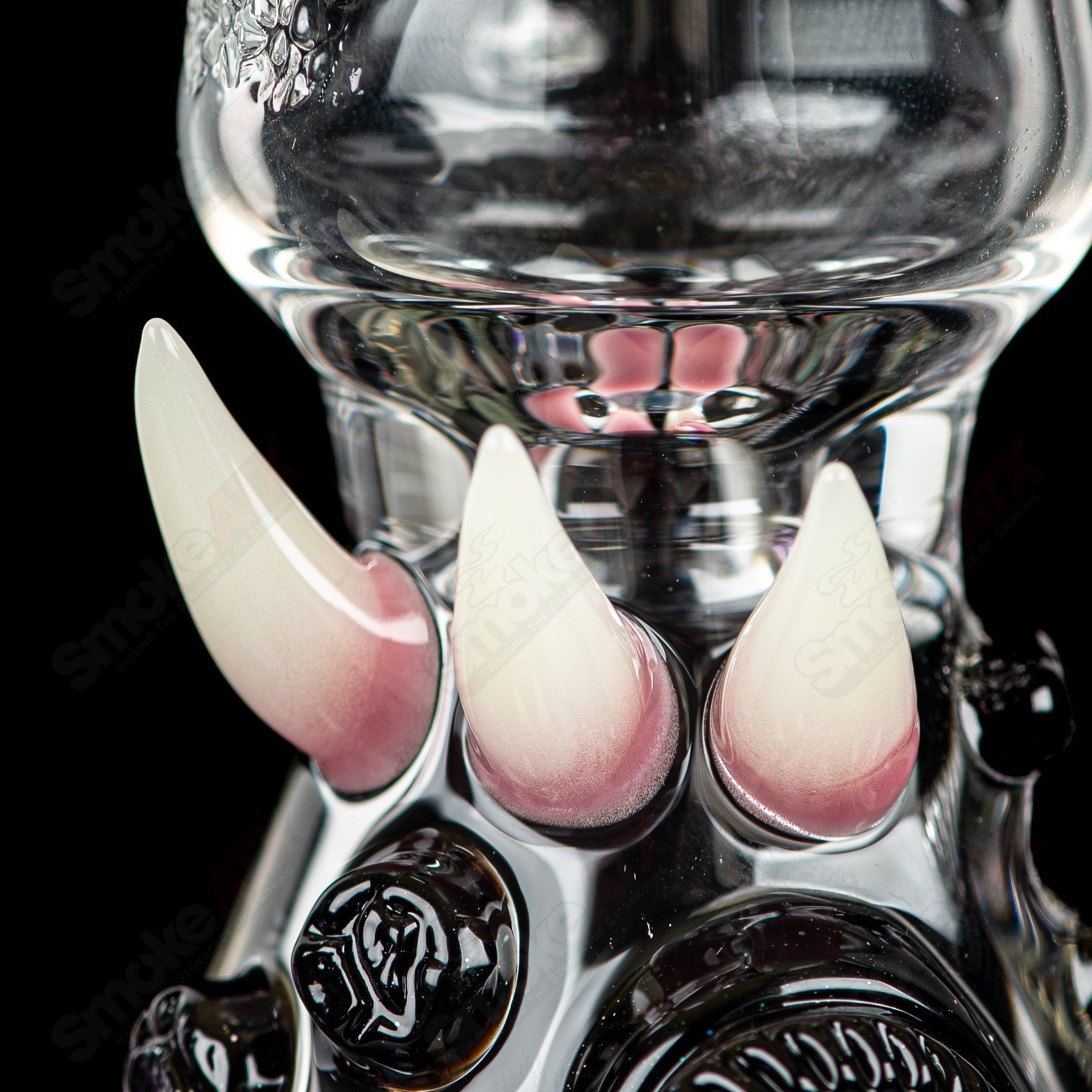 RipCurl by Helix & Salt Glass heady concentrate rig with intricate glass design and clear glass construction.