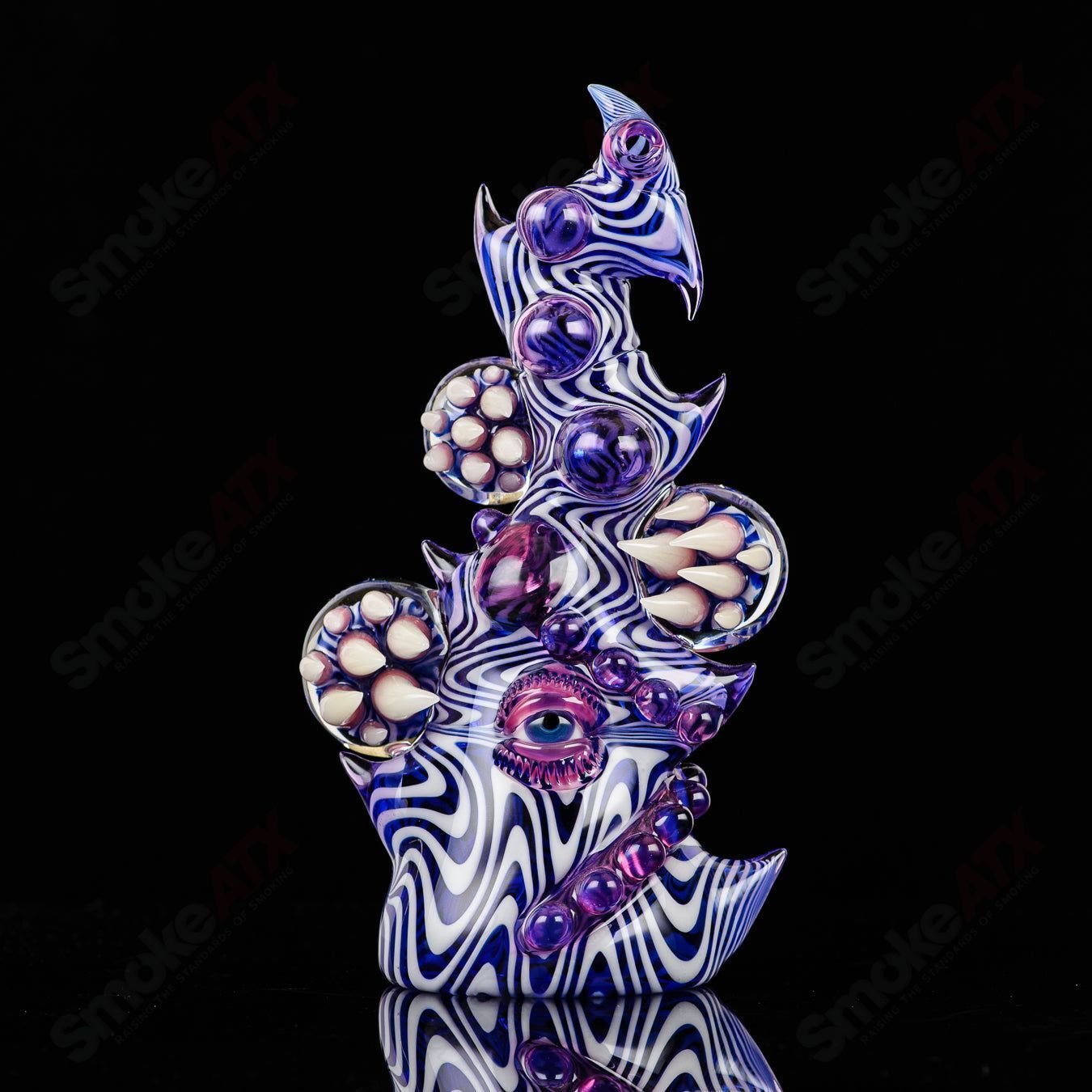 Saltacc Brackish RipCurl by Galactic Glass and Salt Glass, colorful heady concentrate rig with intricate glass design.