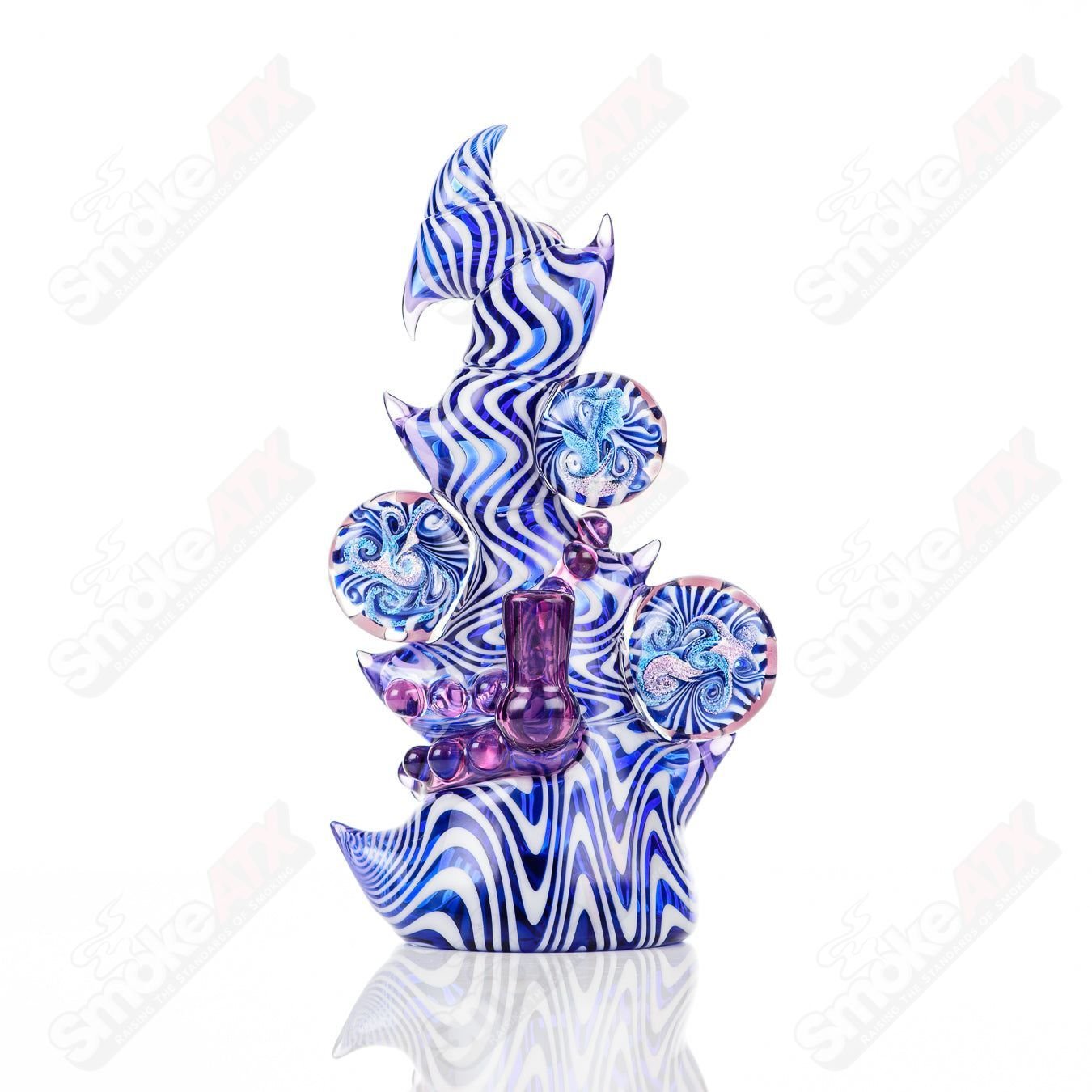 Saltacc Brackish RipCurl heady glass concentrate rig by Salt Glass featuring colorful design and intricate glasswork.