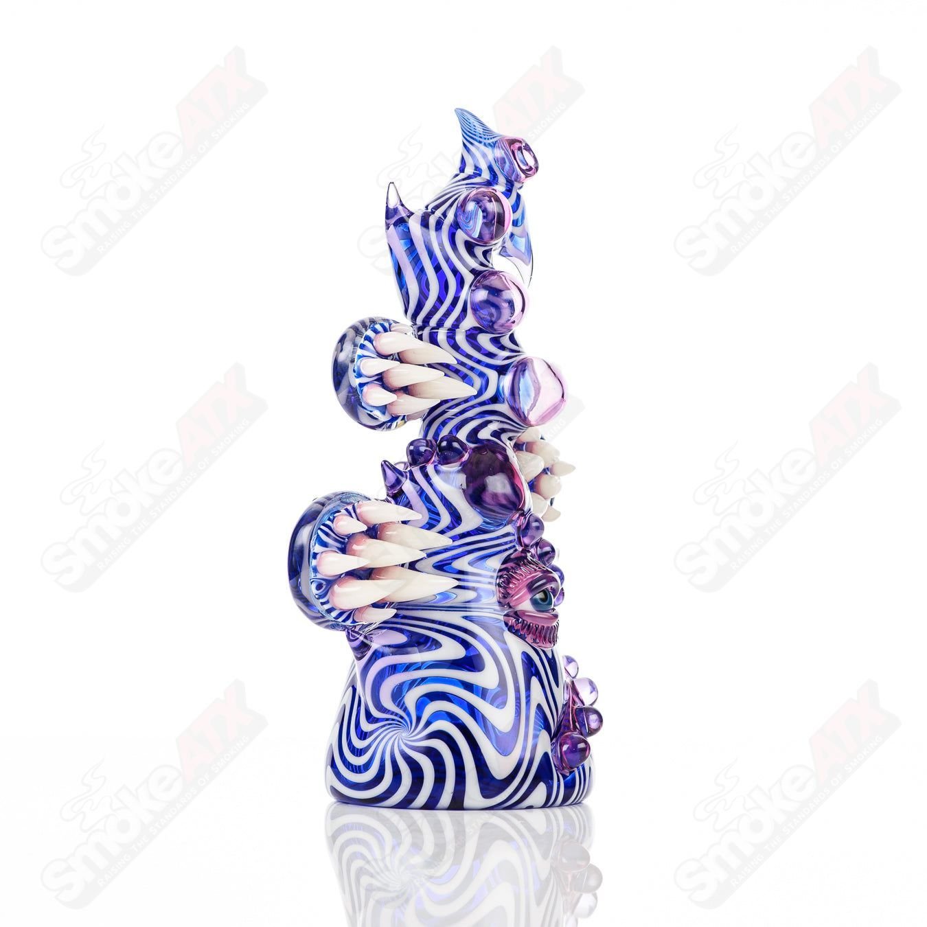 Saltacc Brackish RipCurl by Galactic Glass and Salt Glass, a colorful heady concentrate rig with intricate glasswork.