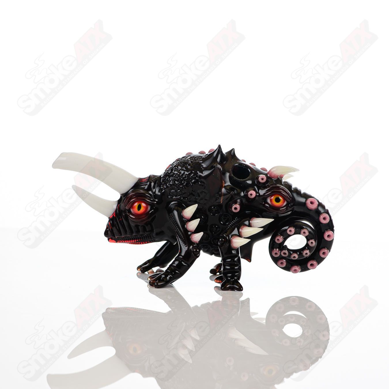 Salty Chameleon by Hardman Glass and Salt Glass Heady Glass concentrate rig with colorful chameleon design and intricate glasswork.