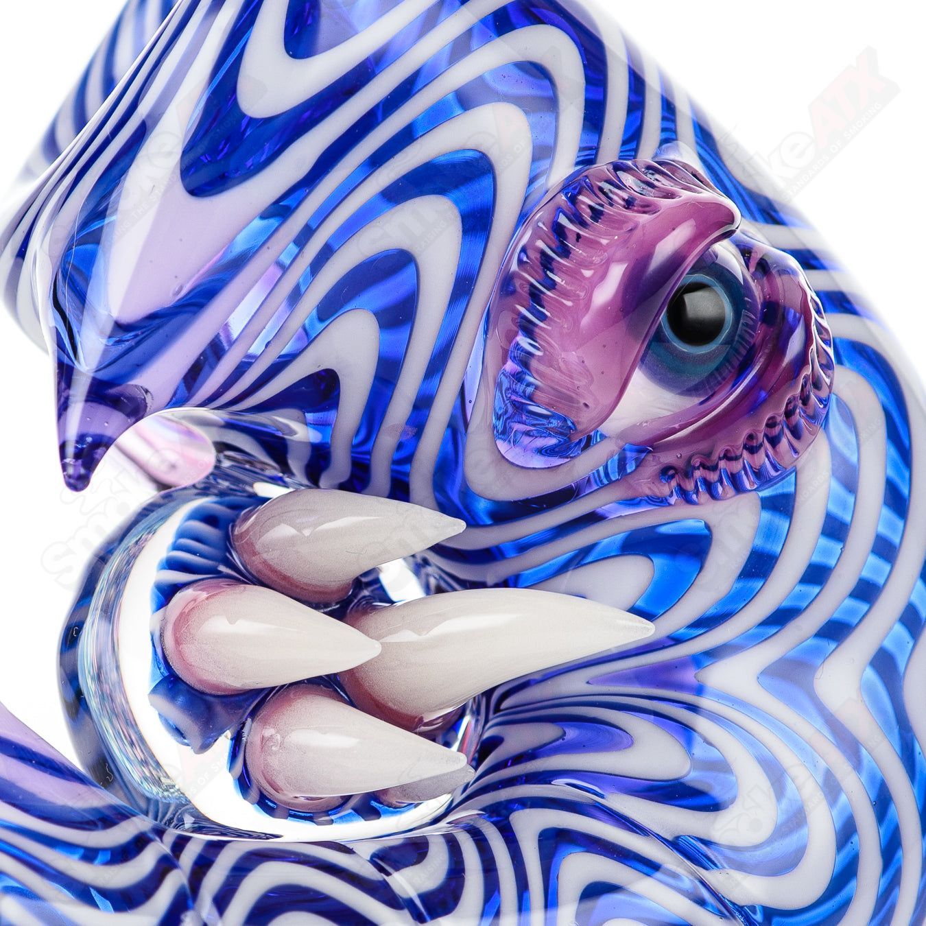 Cobalt blue and white Sherlock glass pipe with royal jelly accents by Salt Glass, featuring galaxy-inspired design and clear mouthpiece.