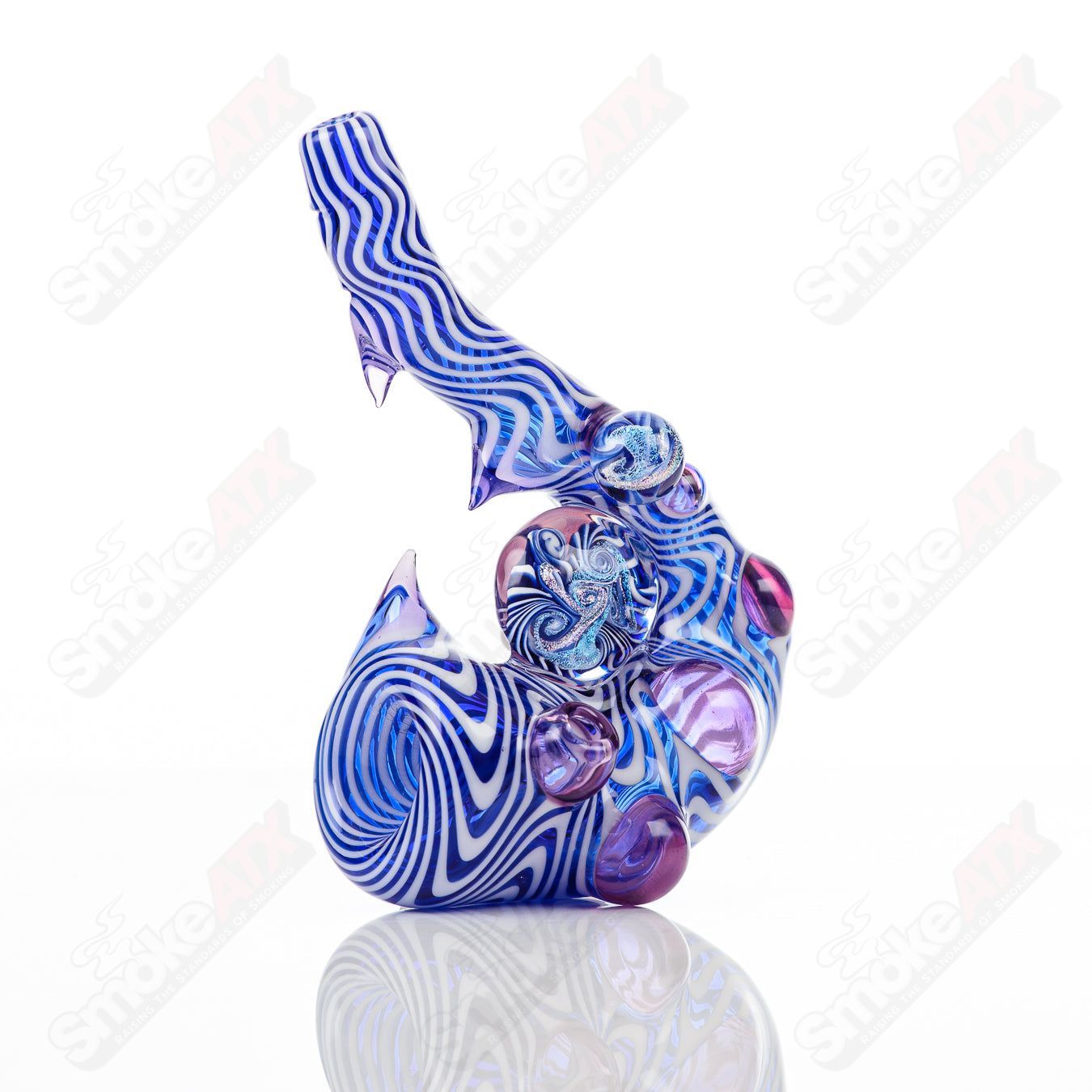 Sherlock heady glass pipe in cobalt blue, star white, and royal jelly colors by Salt Glass, featuring intricate galactic design.