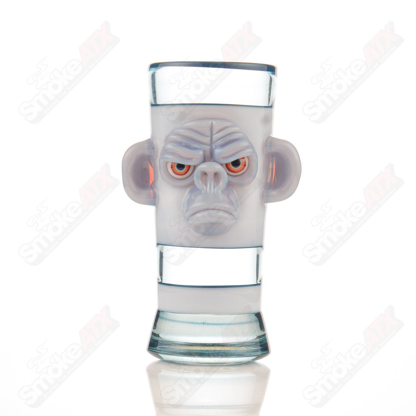 Shifty Monkey drinking glass by Jake C Glass, heady glass cup featuring a colorful monkey design on clear glass.