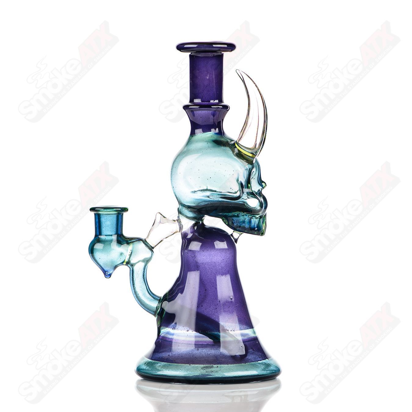 Brando Skull Jammer Rig is a detailed heady glass concentrate rig with a skull design and vibrant colors.