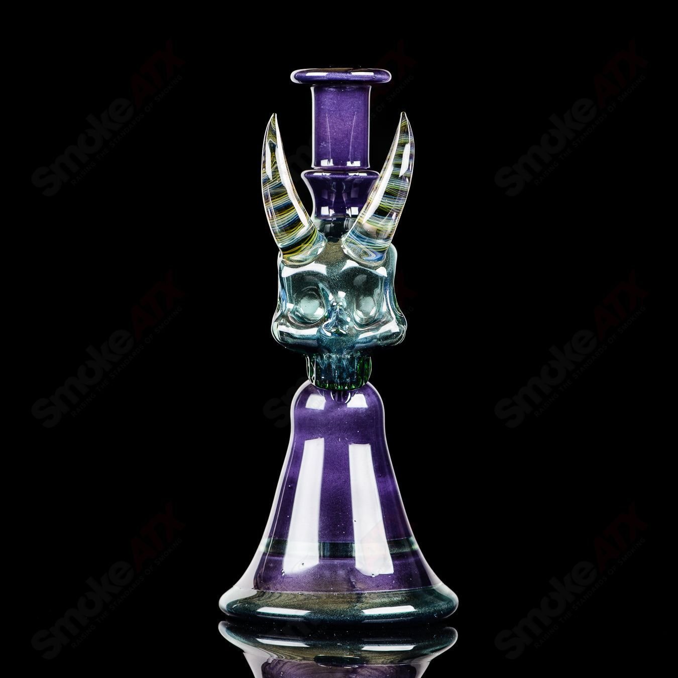 Brando Skull Jammer Rig, a clear heady glass concentrate rig with skull-shaped design and intricate glasswork.