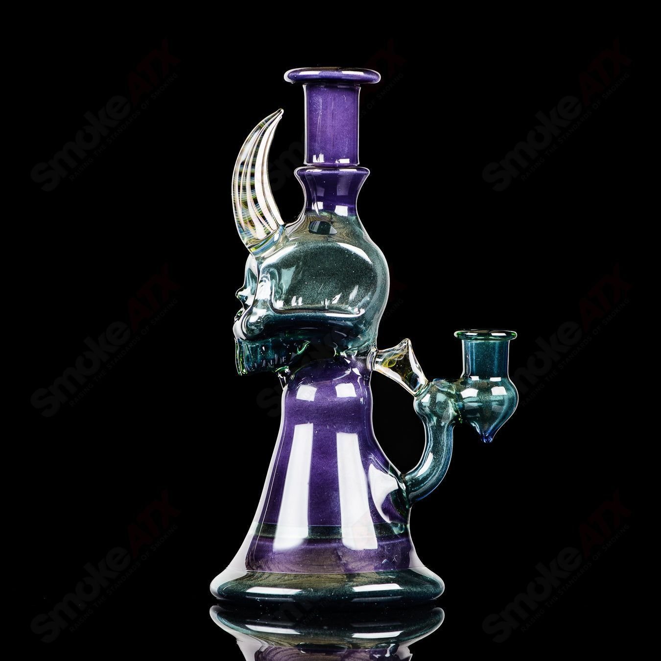 Brando Skull Jammer Rig, a colorful heady glass concentrate rig with skull design and intricate glass artwork.