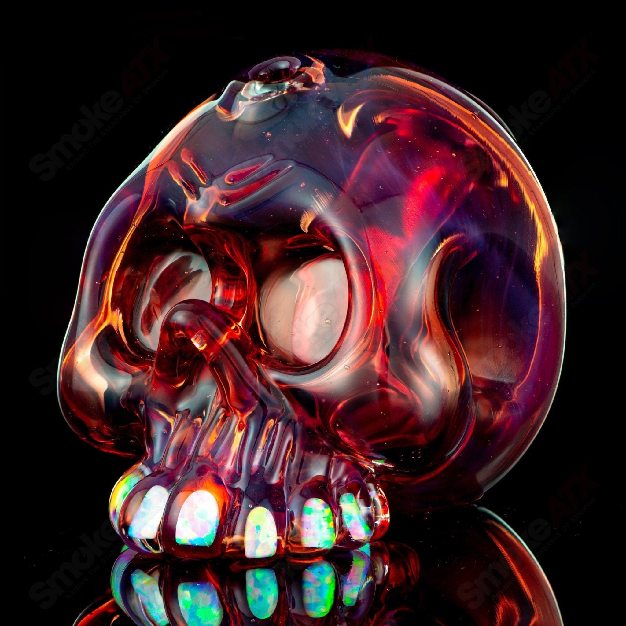 Carsten Carlile Skull Shredder heady glass concentrate rig featuring a detailed skull design and intricate glasswork.