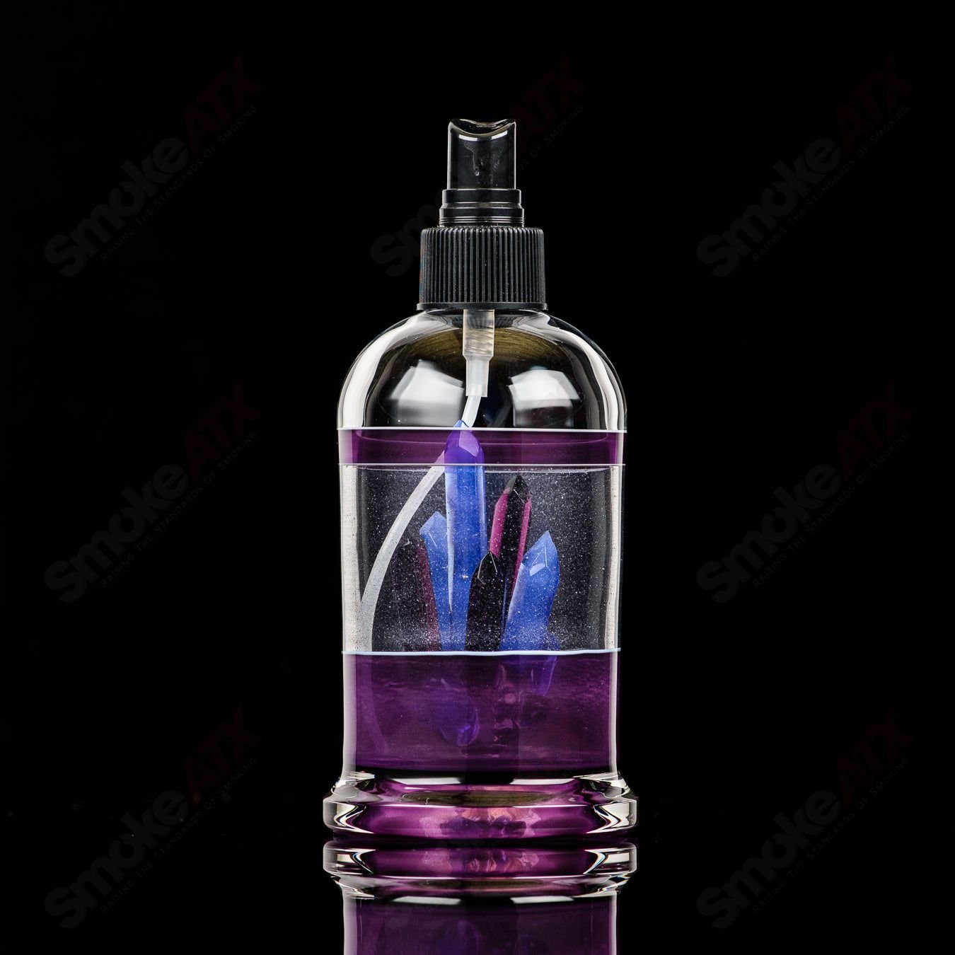 Northern Waters Heady Glass spray bottle featuring detailed artwork, designed for easy use and refill.