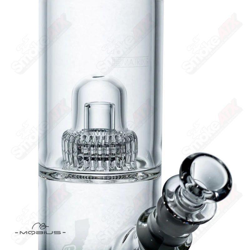 Mobius Strato Matrix V2 clear glass waterpipe with a sleek, cylindrical design and intricate craftsmanship.