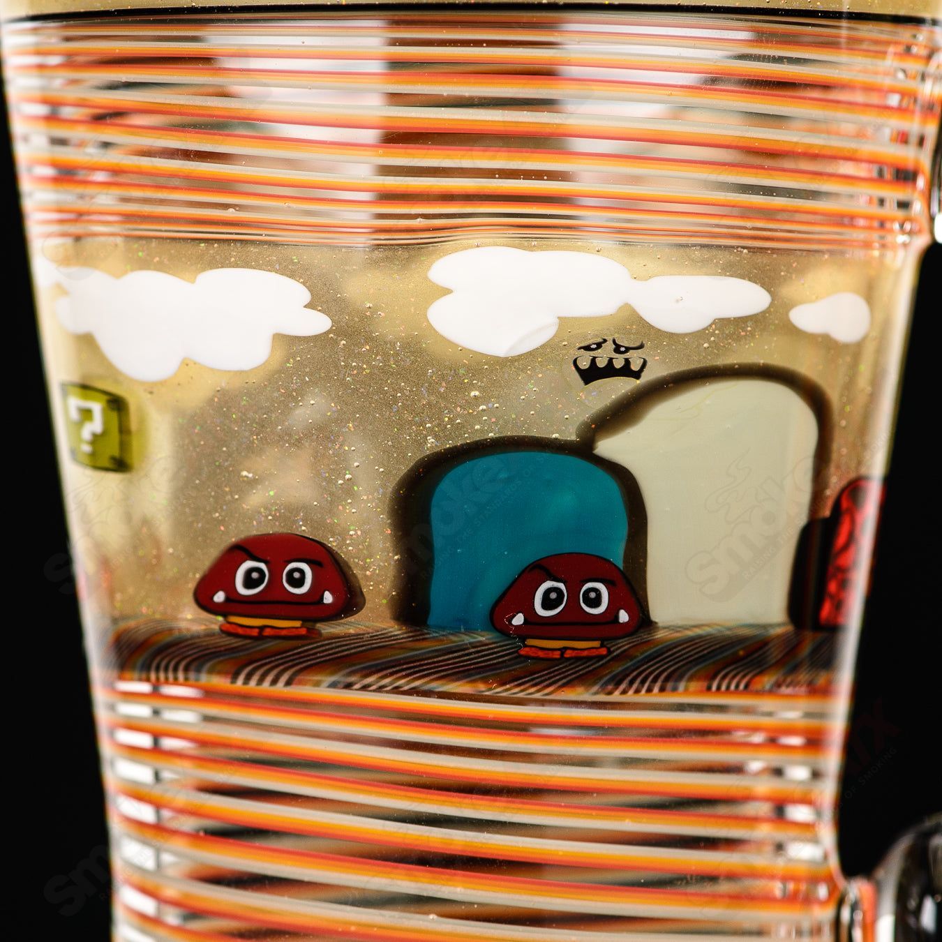 Super Mario themed Milli coffee mug by Micro Glass, featuring colorful Mario graphics on a clear heady glass cup.