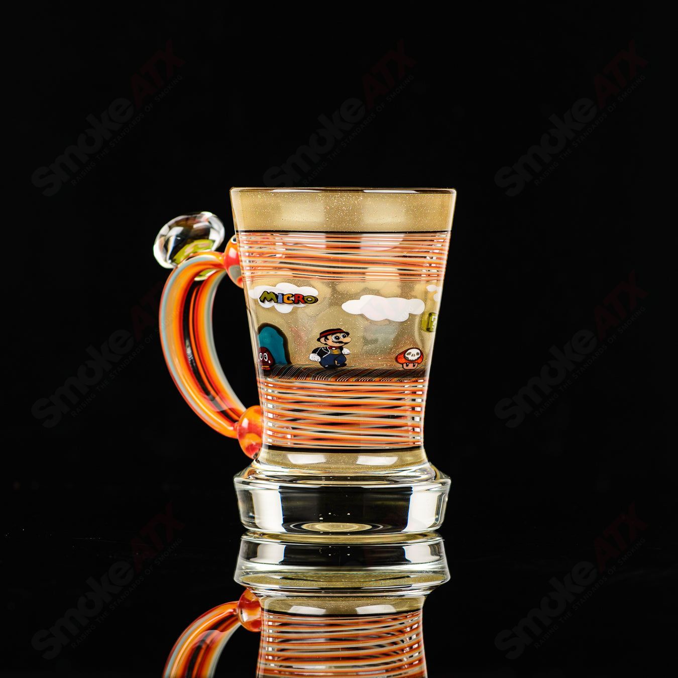 Super Mario themed Milli coffee mug by Micro & SPG, colorful heady glass cup featuring Mario characters and vibrant design.