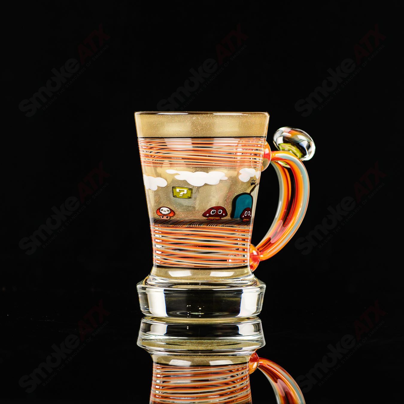 Super Mario theme Milli coffee mug by Micro & SPG, a colorful glass cup featuring Super Mario graphics and character designs.