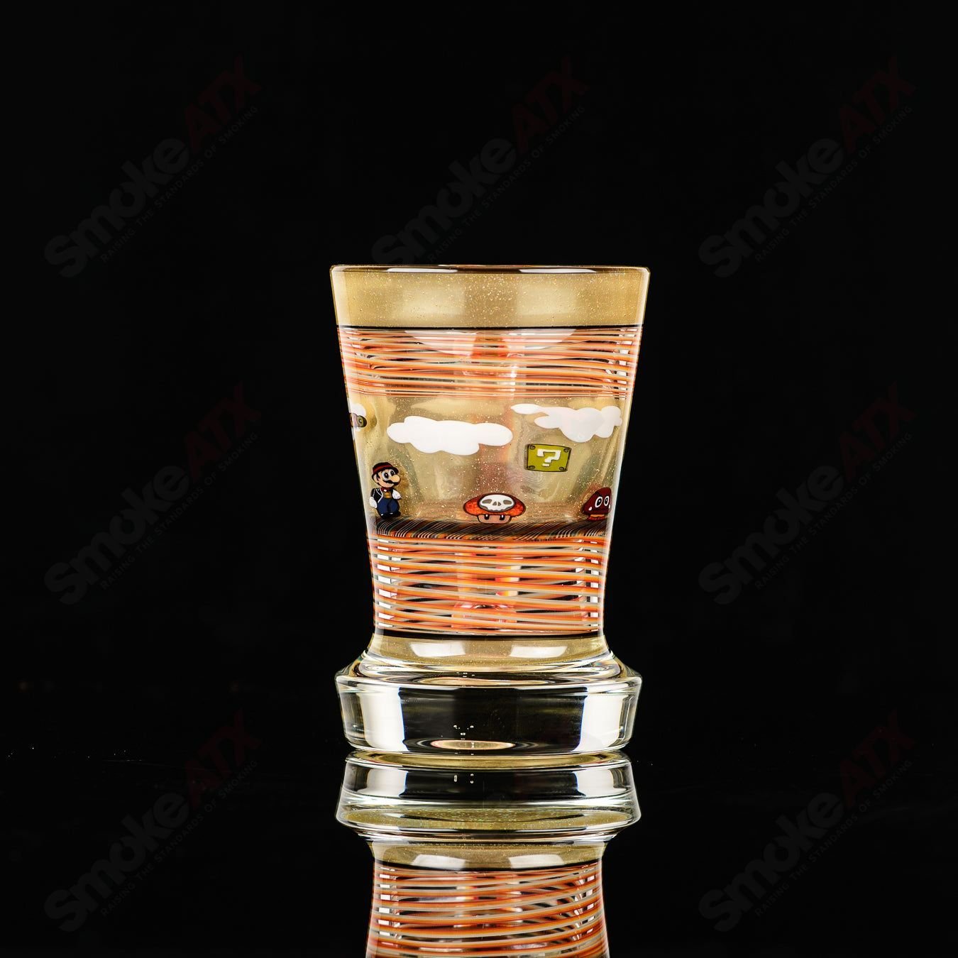 Super Mario themed Milli coffee mug by Micro & SPG, a clear glass cup featuring Super Mario design for coffee or tea.