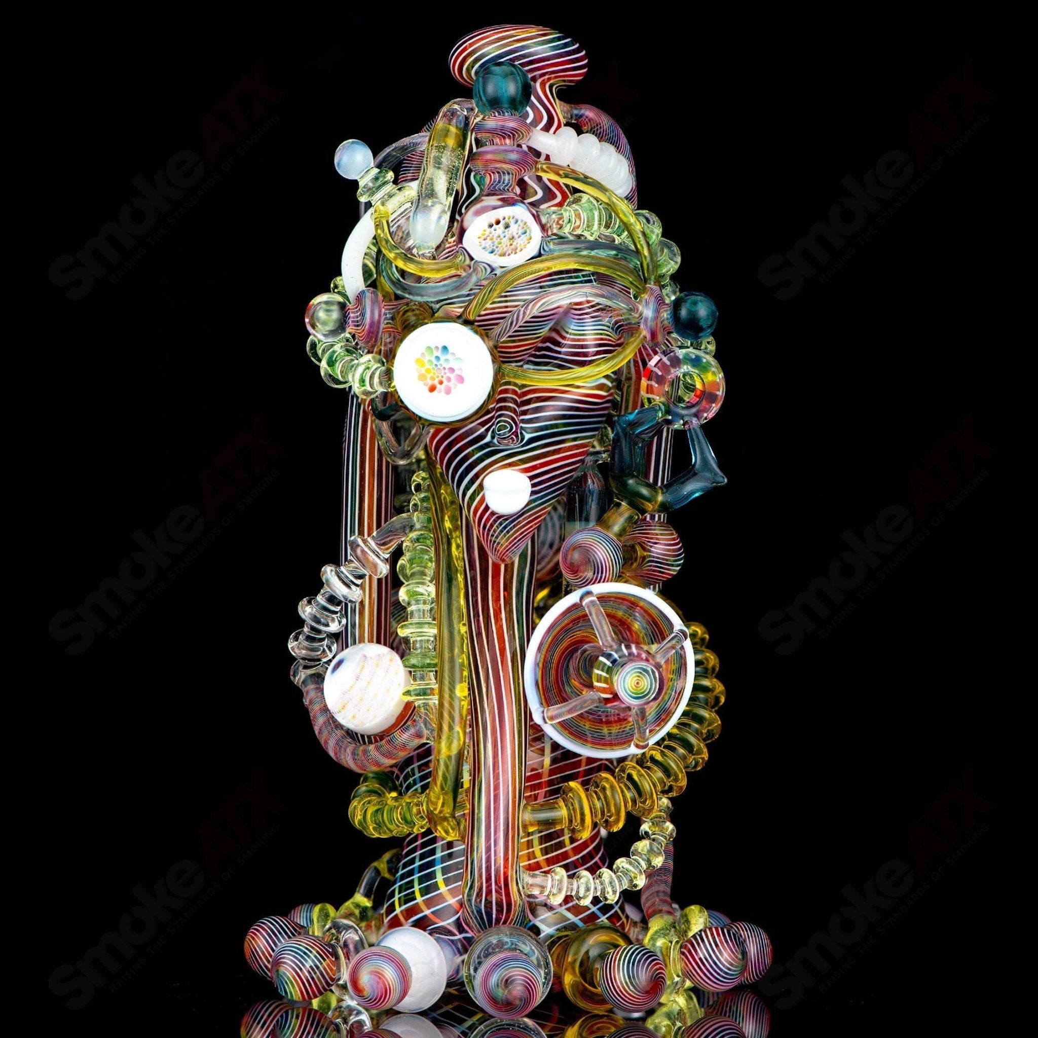 LaceFace x Karma Glass "The Mother Borg" heady glass concentrate rig with intricate lace design and vibrant colors.