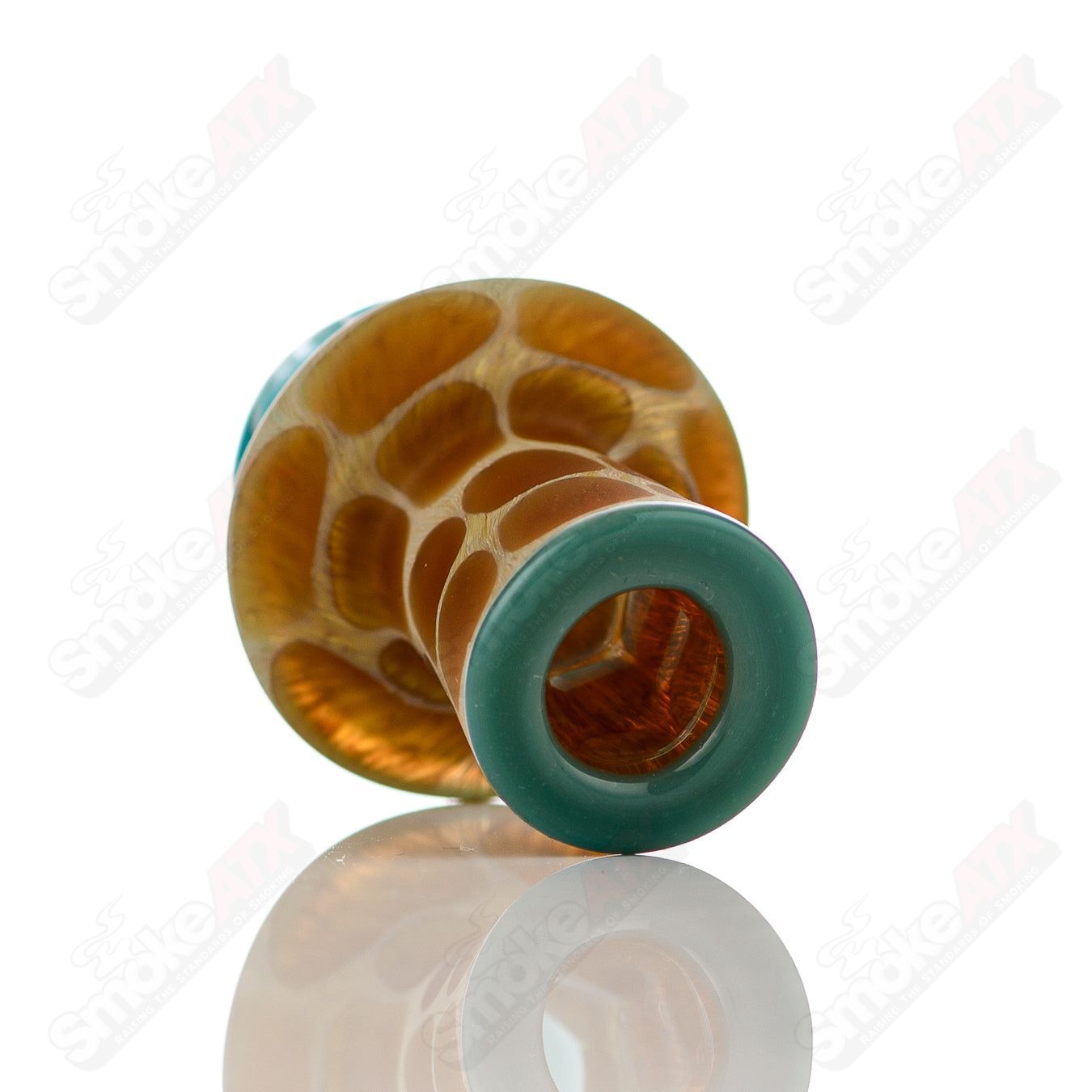 Turquoise giraffe-shaped spinner cap with pearl accents on Robertson Glass heady carb cap, crafted from glass.