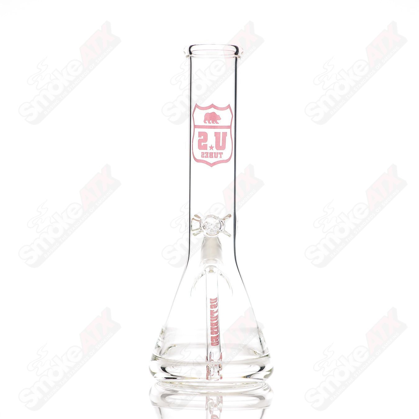 US Tubes glass beaker waterpipe with 12-inch constriction and pink highway decal design.