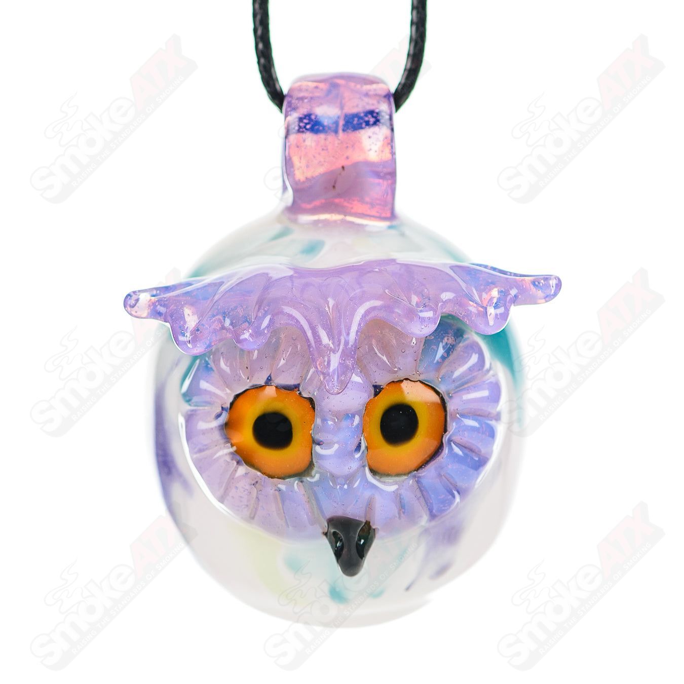 Colorful UV-reactive glass owl pendant by Four Winds Flameworks, featuring splatter and tech design, hanging as a unique jewelry piece.