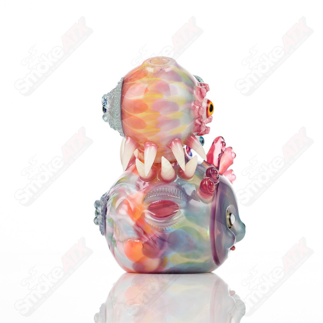 UV Saltacc Tye Dye Chappy concentrate rig by Aquarius x SALT, featuring vibrant colors and intricate glass design.