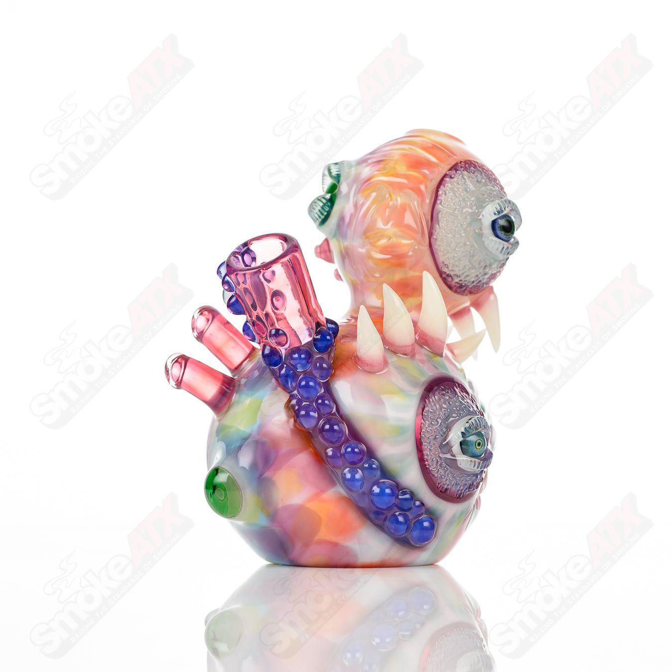 UV Saltacc Tye Dye Chappy concentrate rig by Aquarius x SALT featuring vibrant Tye Dye design and transparent glass accents.