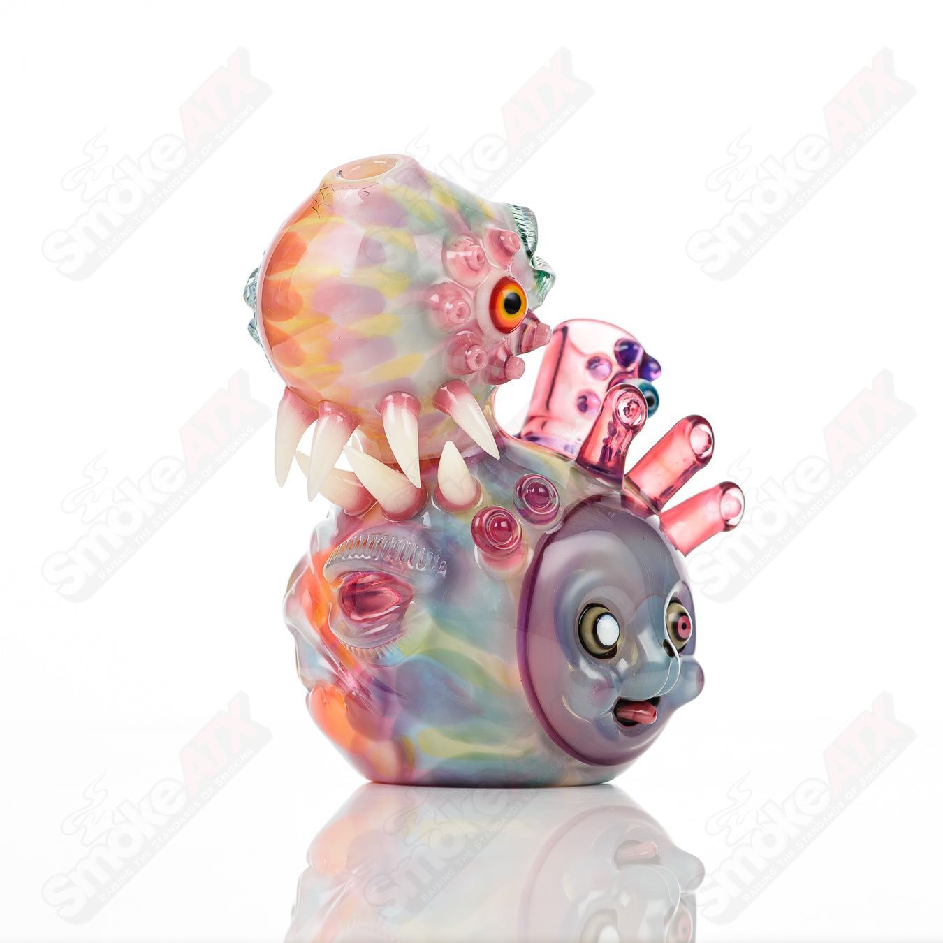 UV Saltacc Tye Dye Chappy heady glass concentrate rig by Aquarius x SALT with vibrant tye dye design and transparent accents.