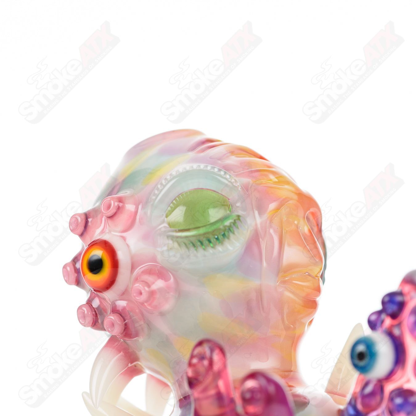 UV Saltacc Tye Dye Chappy heady glass concentrate rig by Aquarius x SALT with vibrant tye dye design and transparent sections.