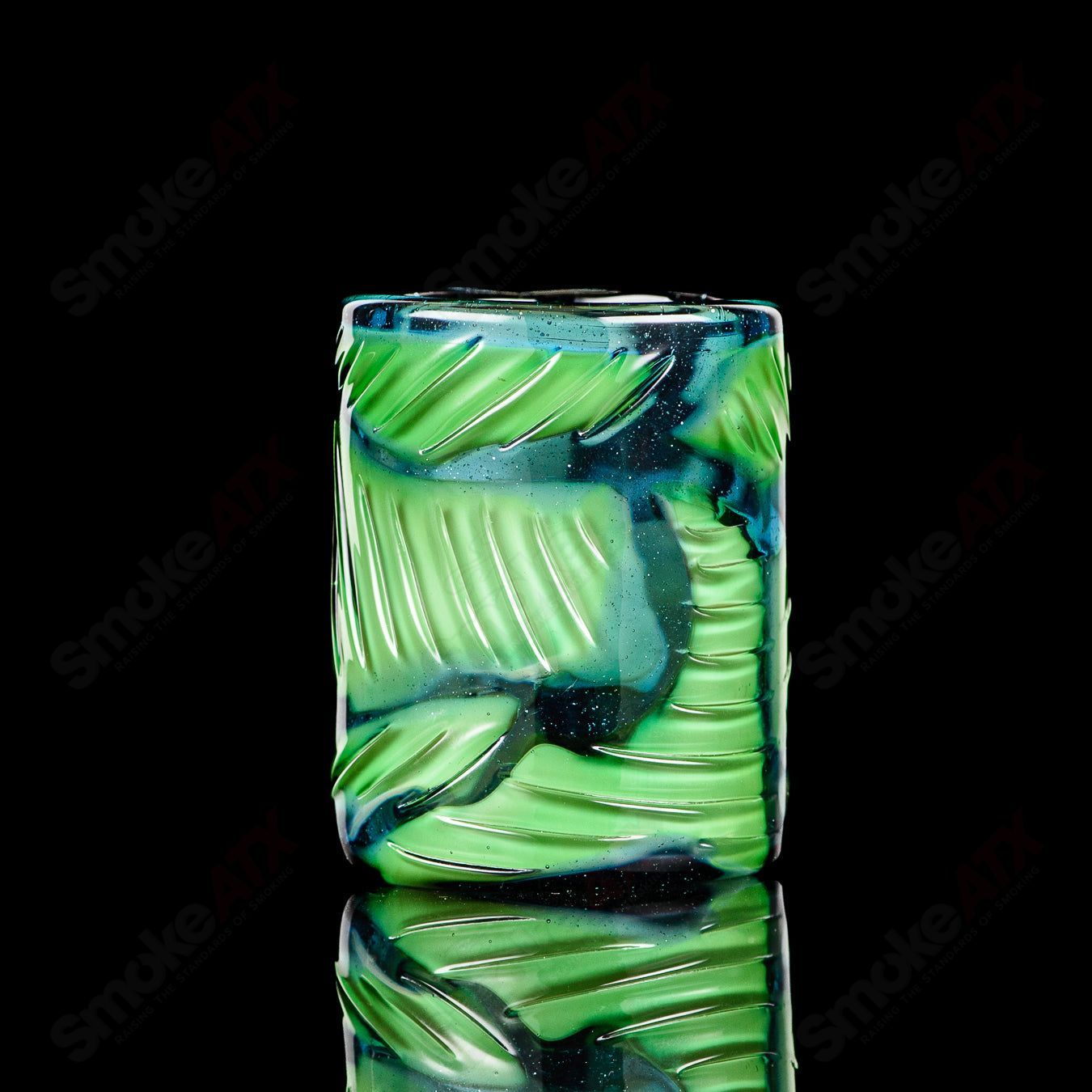 UV Salty Eye Shot Glass with teeth design by Salt Glass, featuring vibrant UV-reactive colors and detailed eye and teeth artwork.
