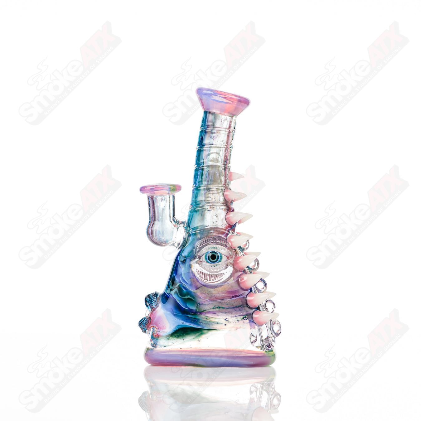 UV tie-dye glass soul flask by Nobody x SALT, a colorful heady glass concentrate rig with vibrant tie-dye design.