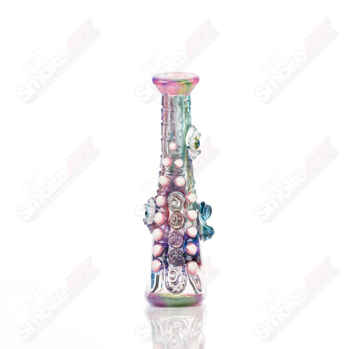 UV tie-dye glass concentrate rig called Soul Flask by Nobody x SALT, featuring vibrant colors and a compact heady glass design.