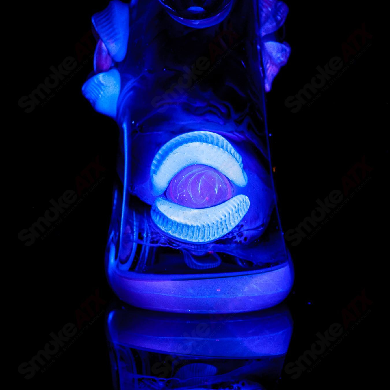 UV tie-dye Soul Flask glass by Nobody x SALT, a colorful heady glass concentrate rig with vibrant tie-dye design.