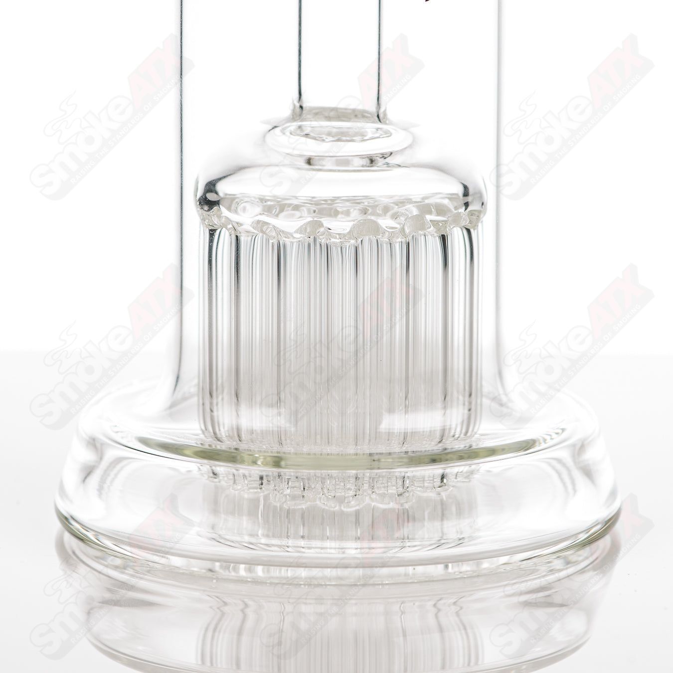 White Label 29-arm bubbler glass by Leisure, clear glass with intricate arm design, perfect for smooth smoking experience.