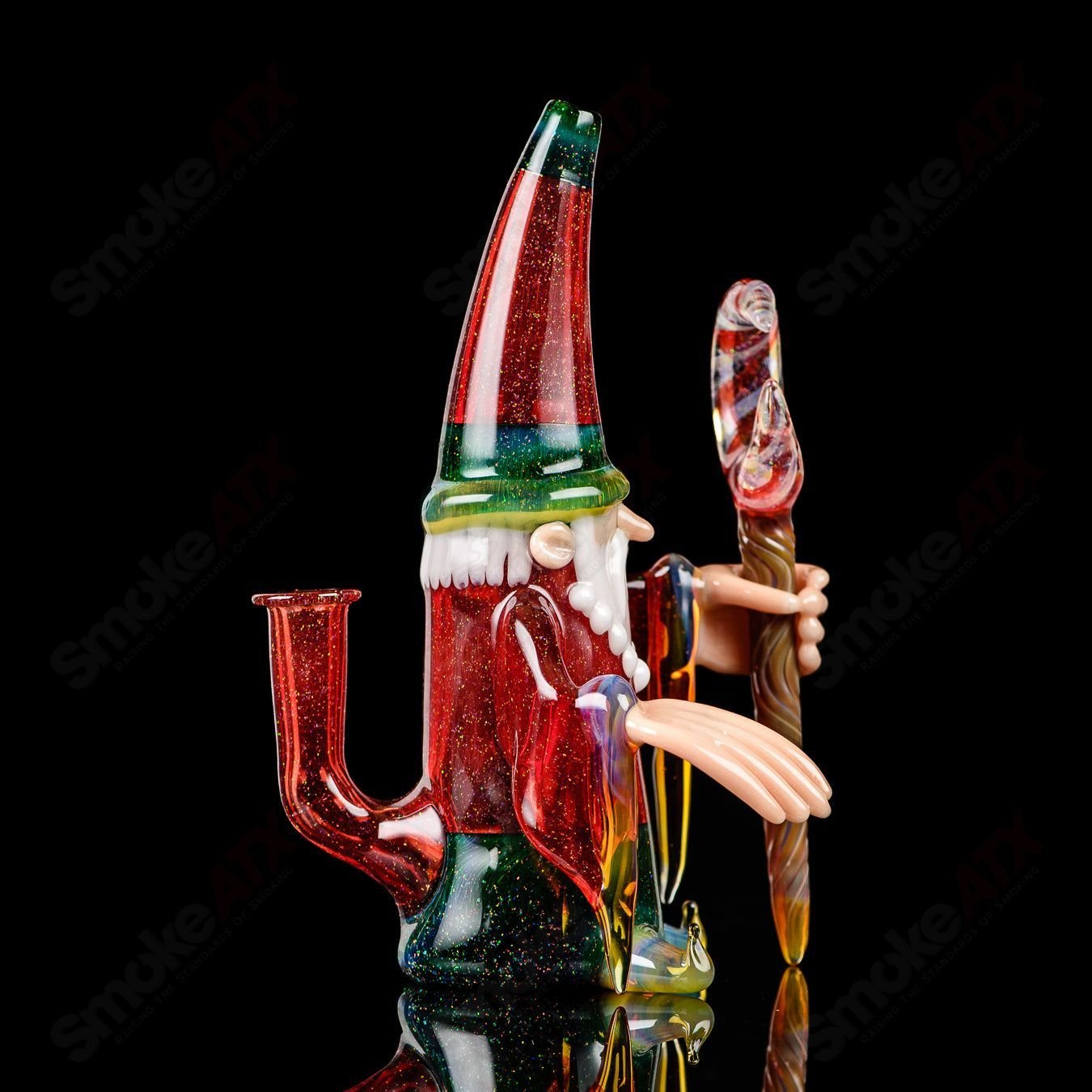 Phil Siegel Wizard Rig Classic heady glass concentrate rig with intricate design and clear glass construction.