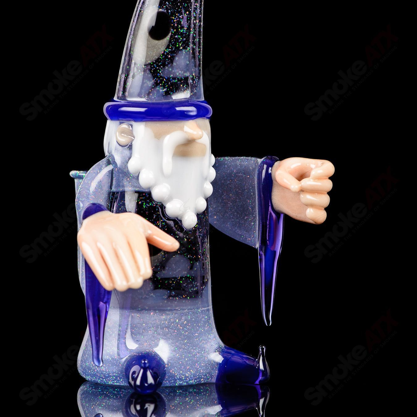Heady glass Wizard Rig Stargazer by Phil Siegel, featuring intricate glasswork and a wizard design for concentrate use.
