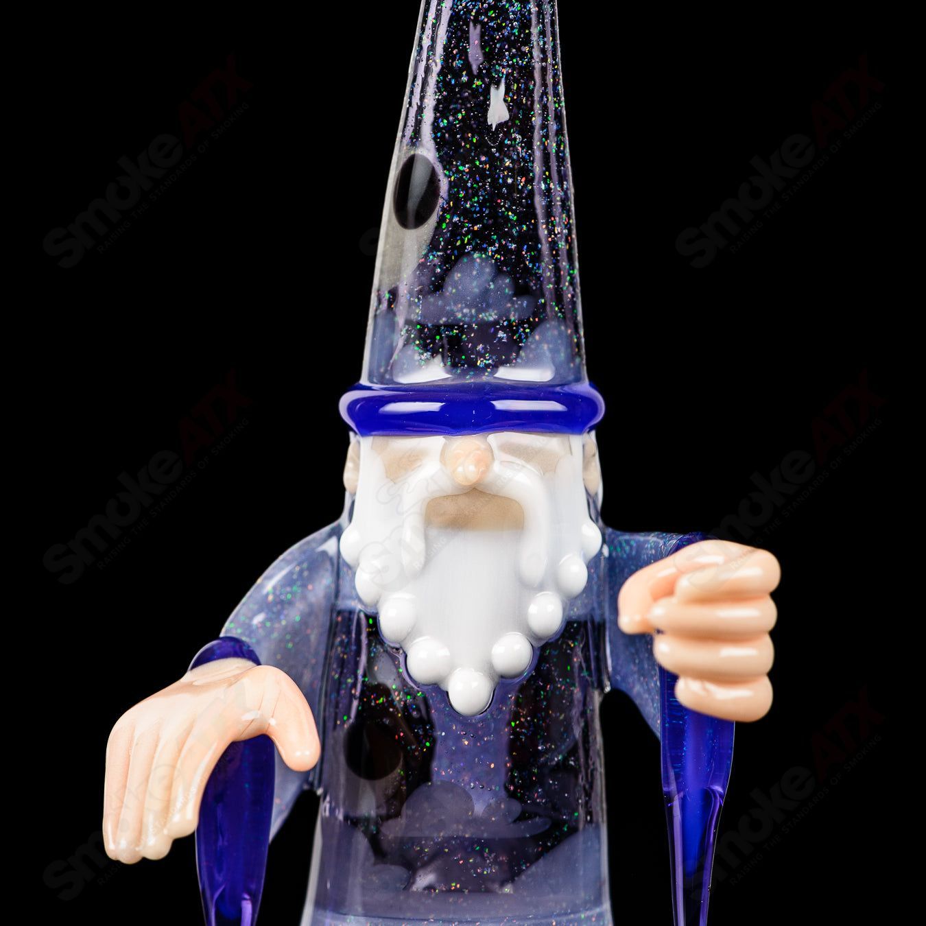 Phil Siegel Wizard Rig Stargazer, a clear heady glass concentrate rig with intricate star and wizard motifs, designed for dabbing.